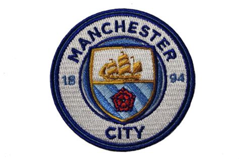 man city 1894 badge